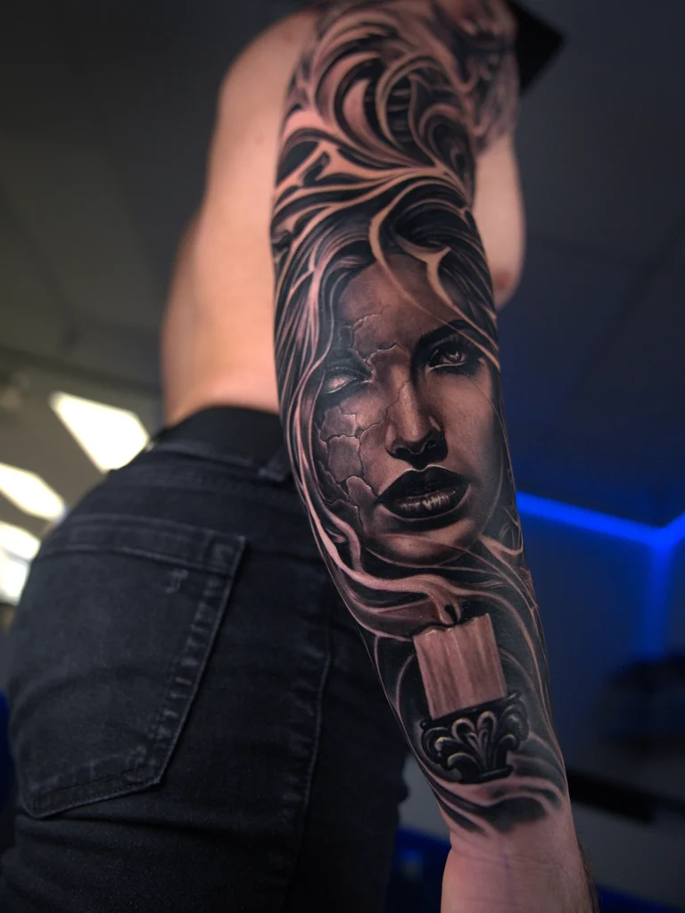 Black and grey portrait with truck memorial forearm tattoo