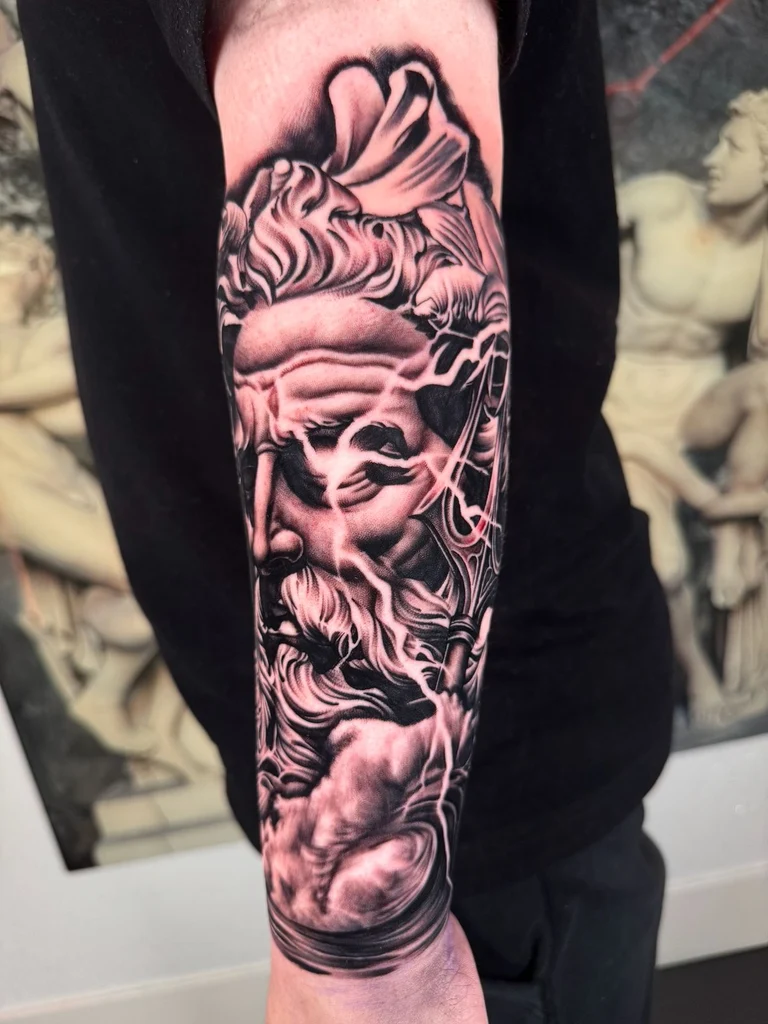 Black and grey Mayan pyramid and eclipse forearm sleeve tattoo